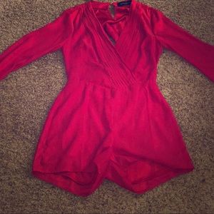 Akria- Red long-sleeve romper. Brand new.